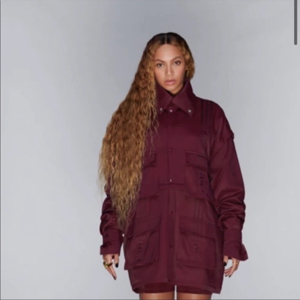 Never worn. Tag still on. Maroon convertible.